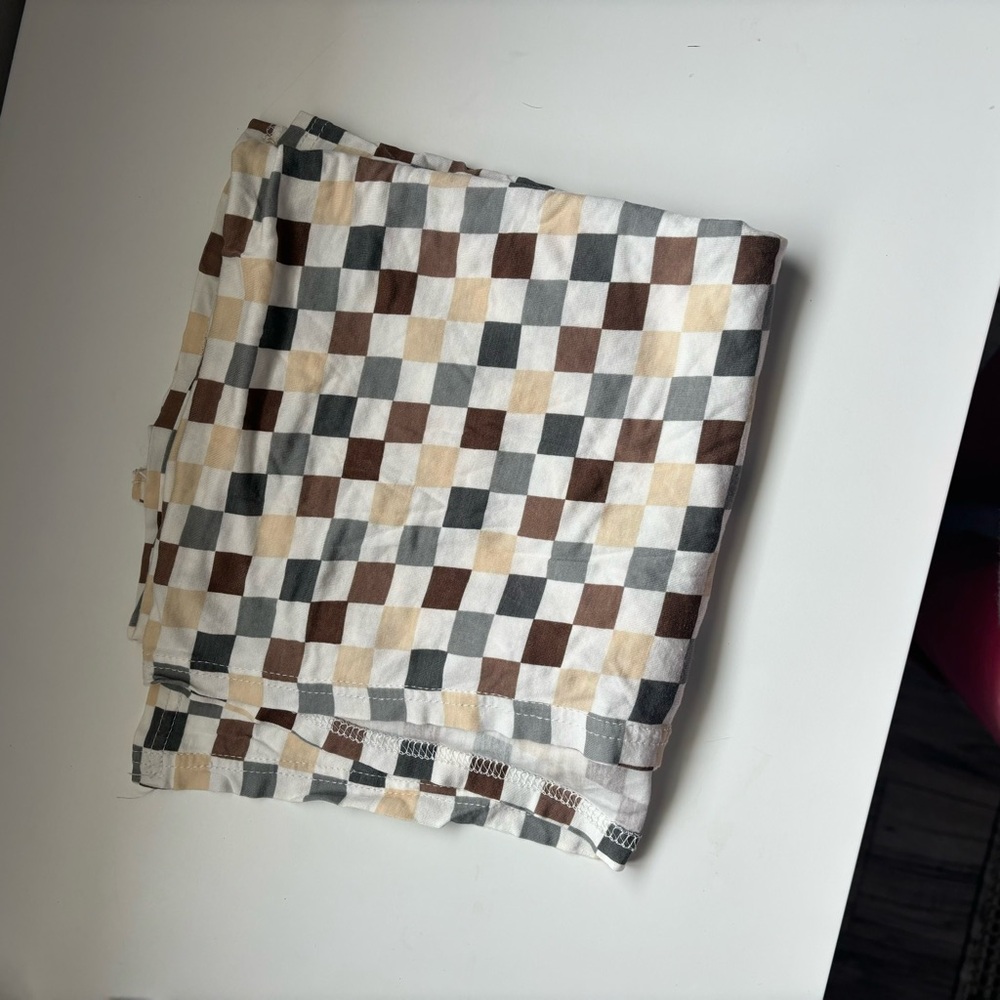 Milk berry checkered swaddle blanket